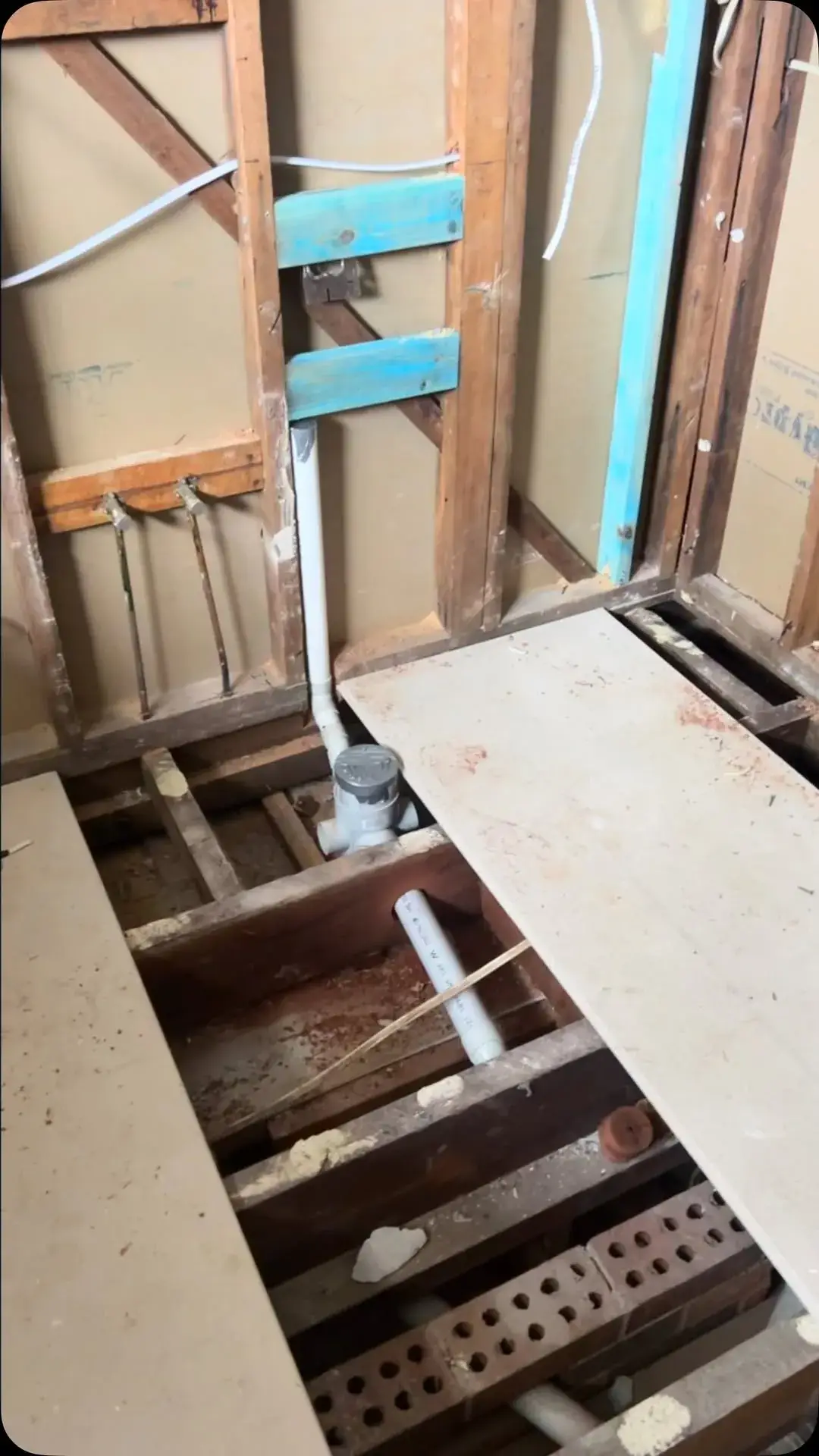 Bathroom rough-in: in-wall cistern and waste through the floor