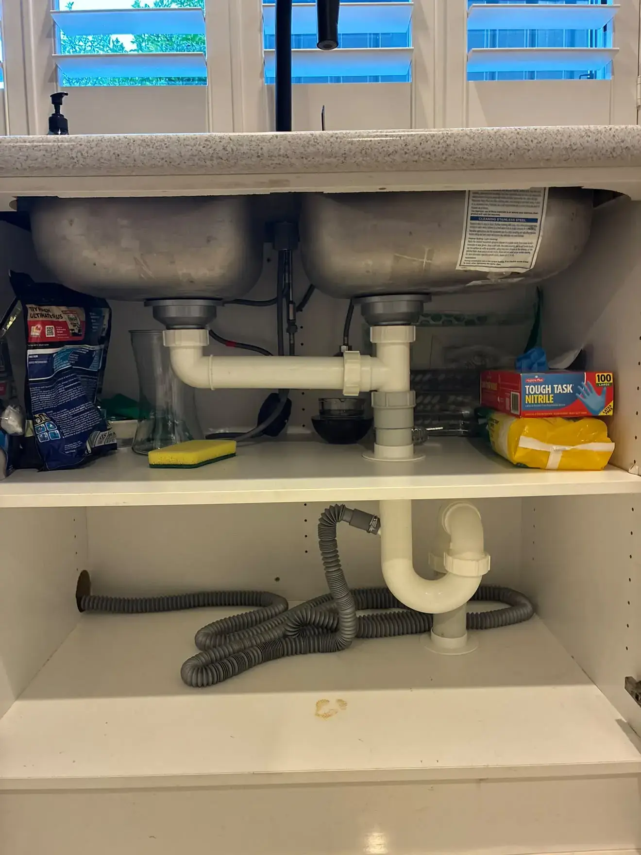 Before: the old waste and trap under the sink, Balcolyn.