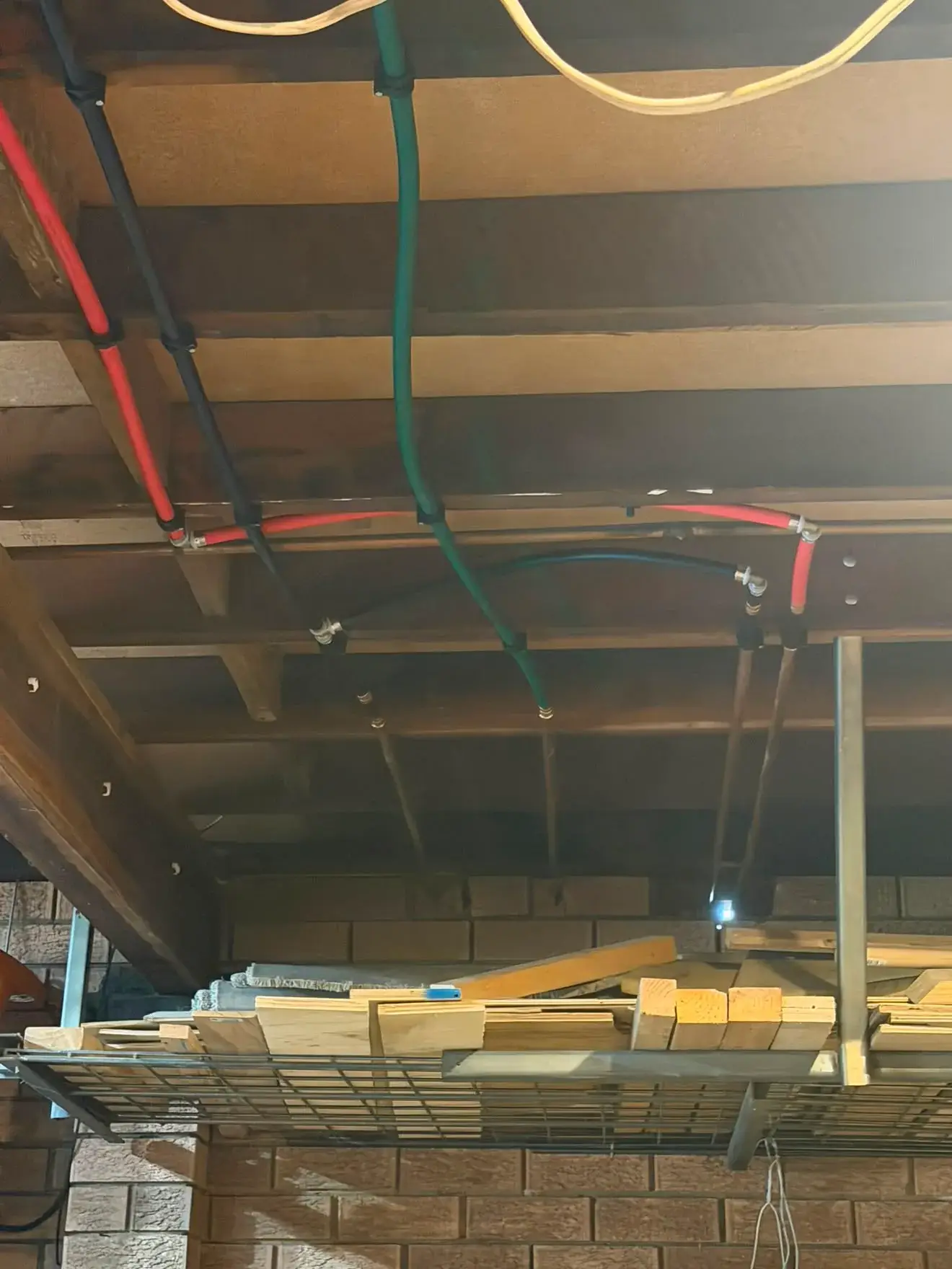 New supply lines run through the ceiling framing, Bateau Bay.