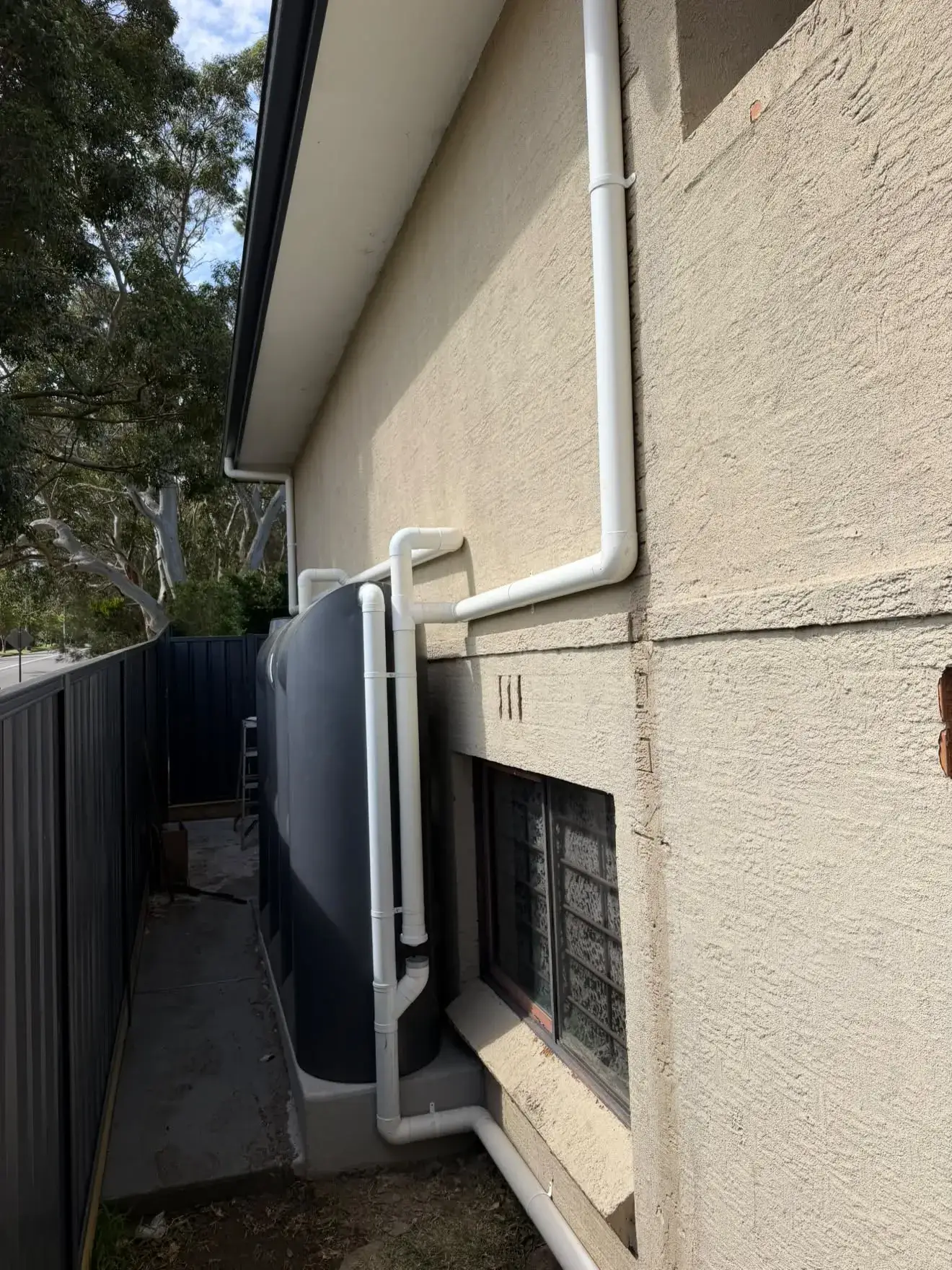 New rainwater tank fed by the redesigned downpipes, Bateau Bay.