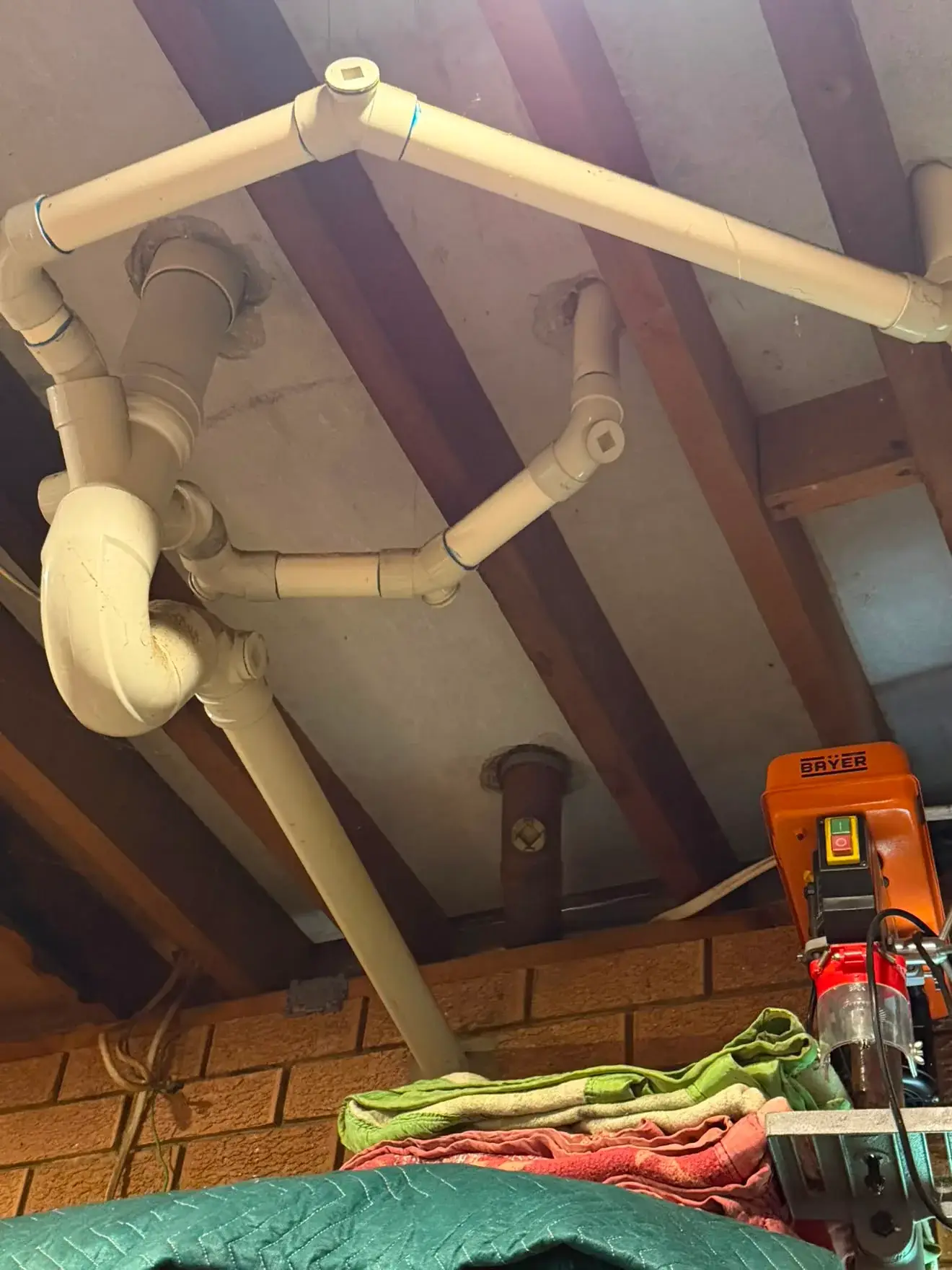 Stack renewal in the garage: traps set for the bathroom, powder room and laundry above.