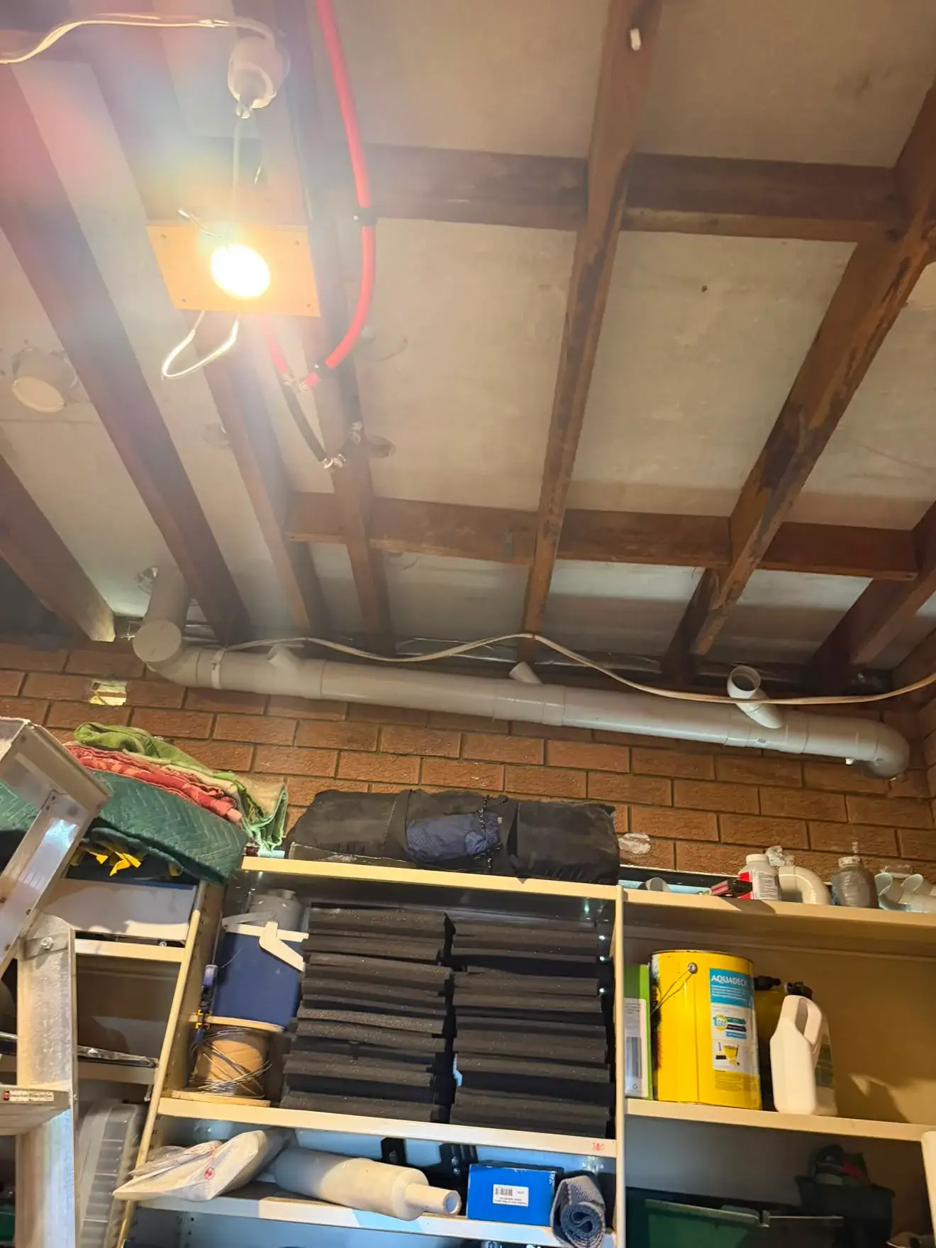 New 100mm PVC stack through the garage ceiling joists.