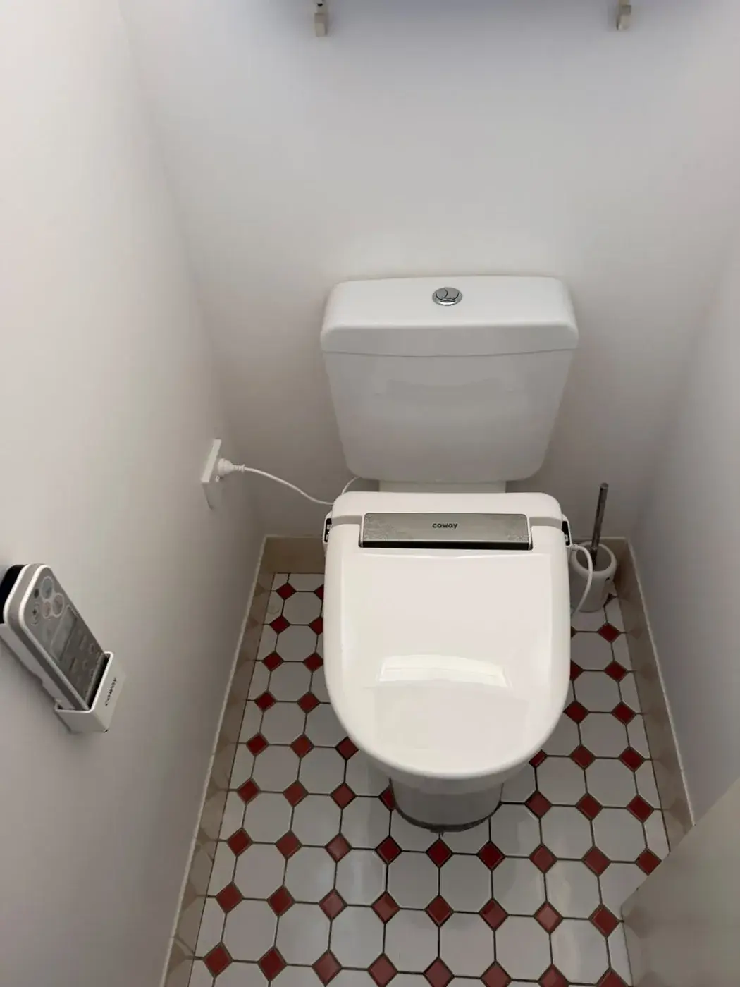 Heated bidet seat retro-fitted to an existing suite, water and power connected, Merewether.