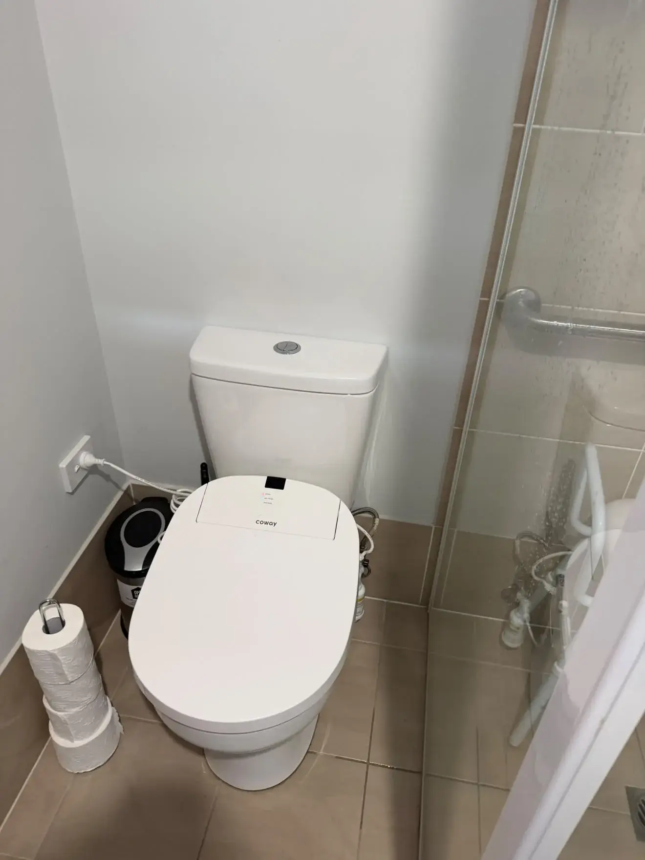 Electric bidet seat fitted to an existing toilet suite, Chisholm.