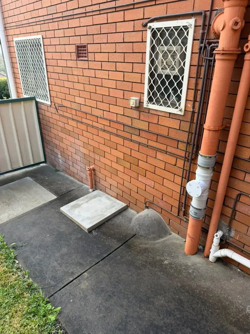 Before: the pad and connections ready for the new electric storage unit, Merewether.