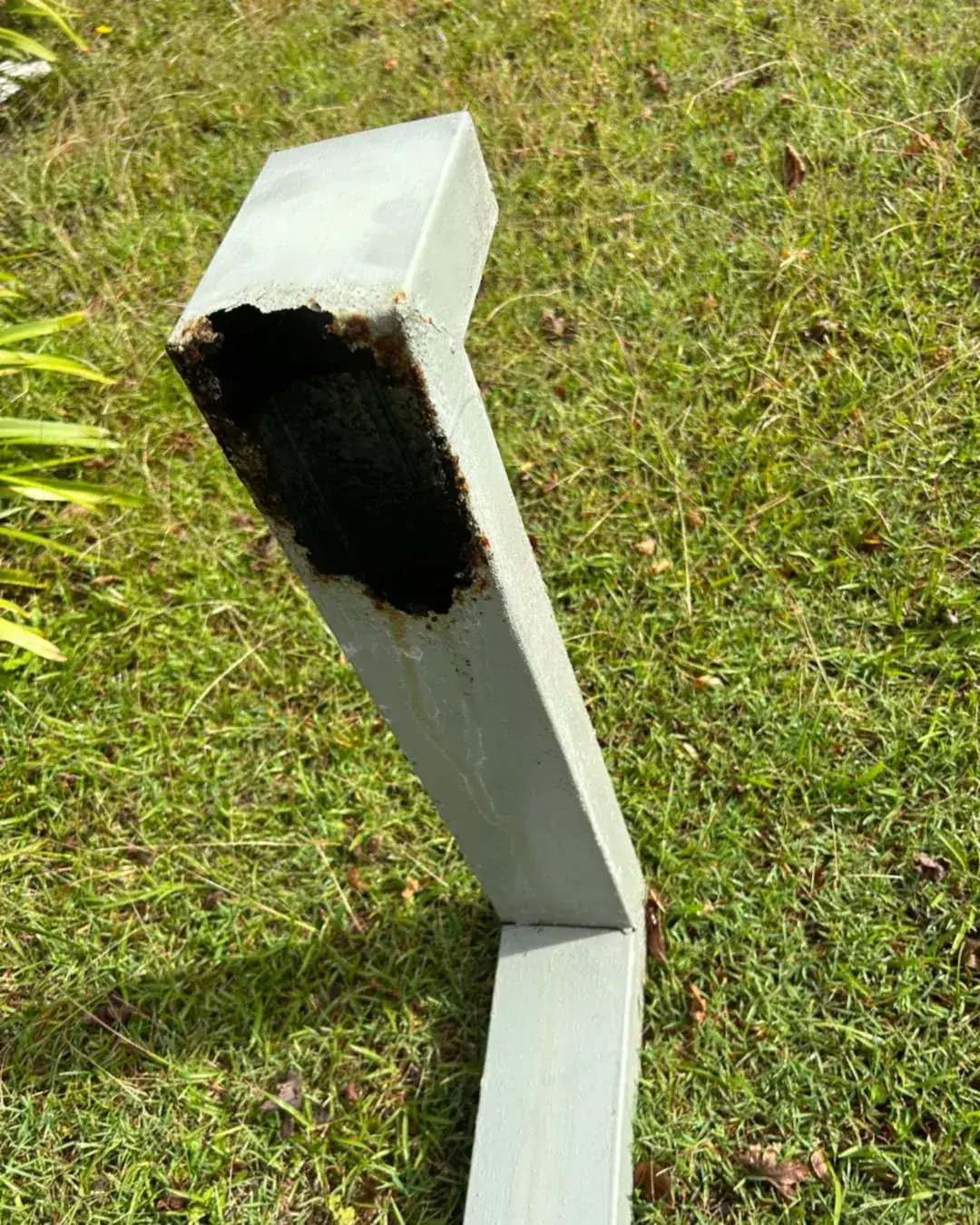 Failed metal downpipe, replaced with PVC
