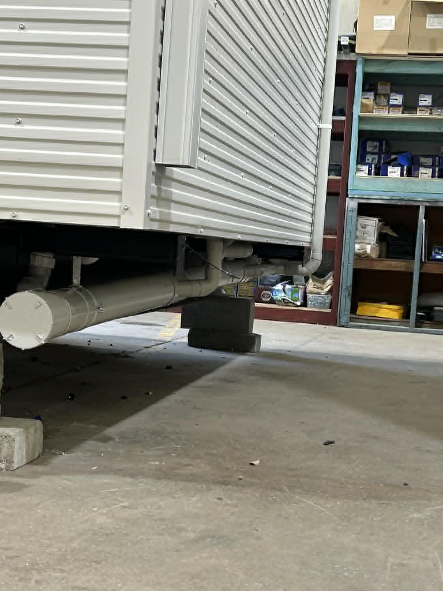 Waste and stormwater runs under a site amenities module