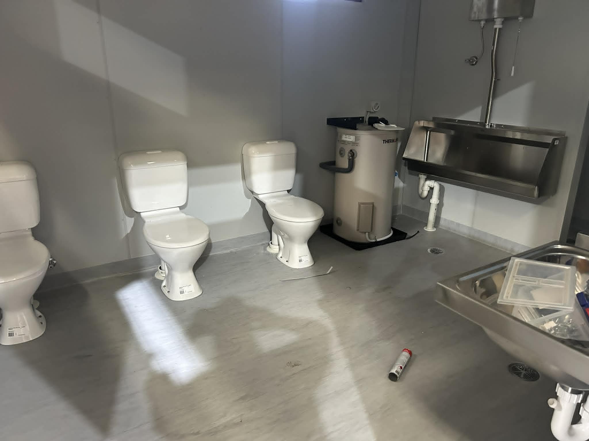Amenities module: toilets, Thermann storage and stainless urinal