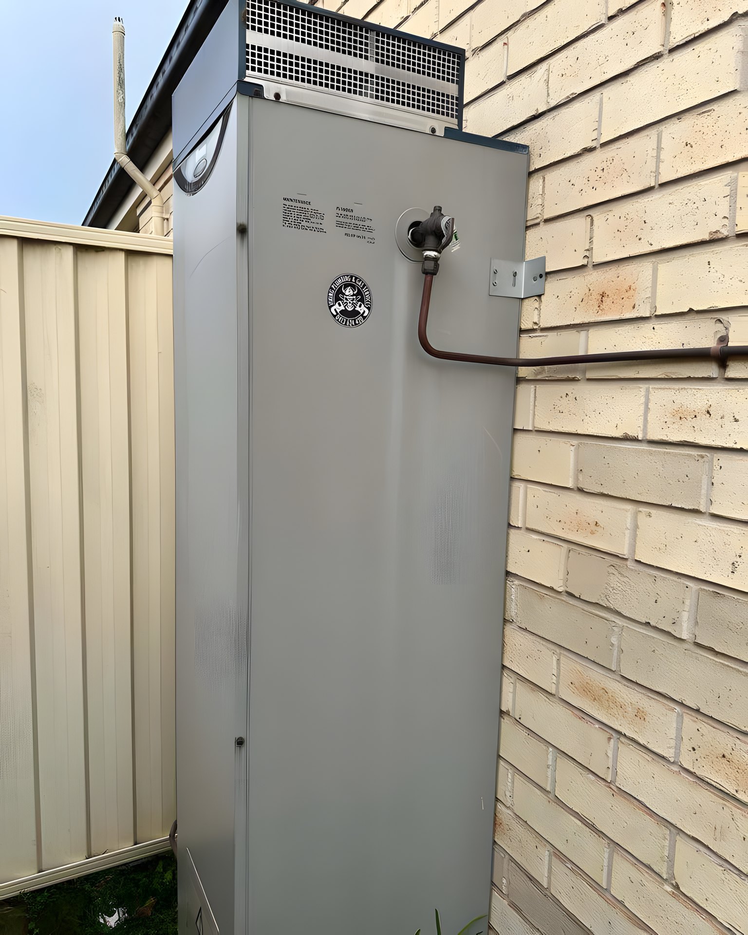 Twenty-year gas storage unit on the wall, before the G-series swap