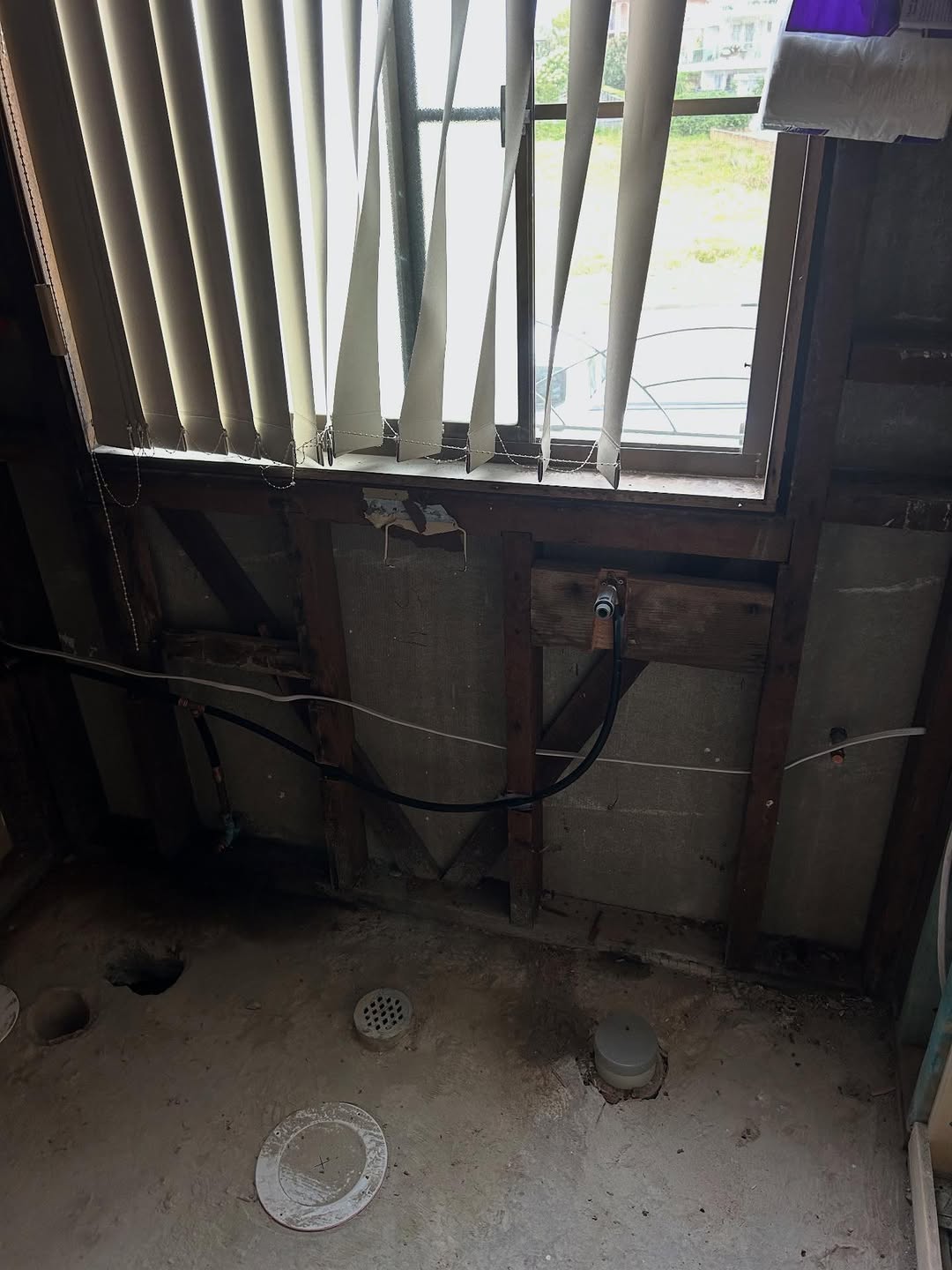 Core holes through a suspended slab for a bathroom re-arrange, The Entrance