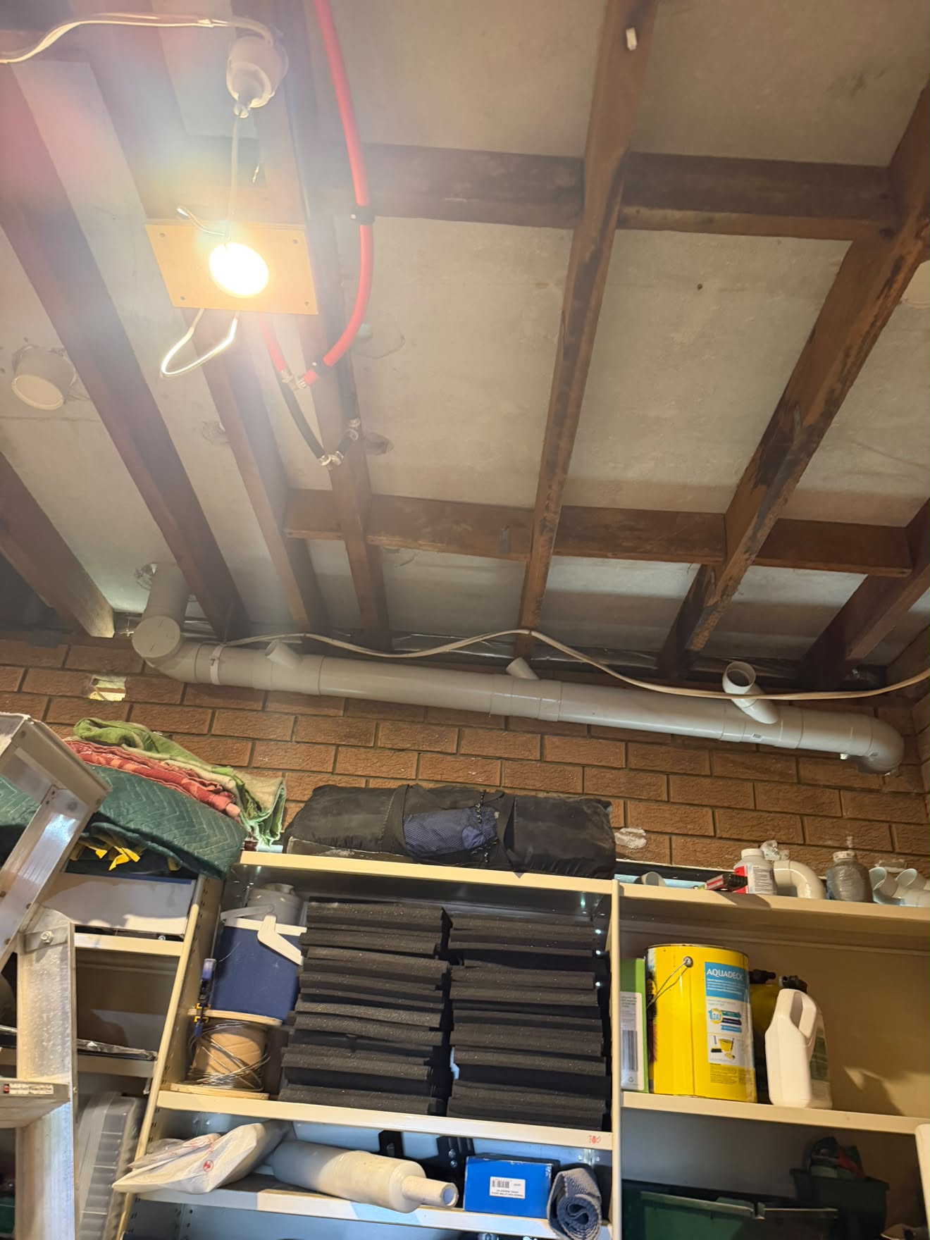 New 100mm PVC stack through the garage ceiling joists.