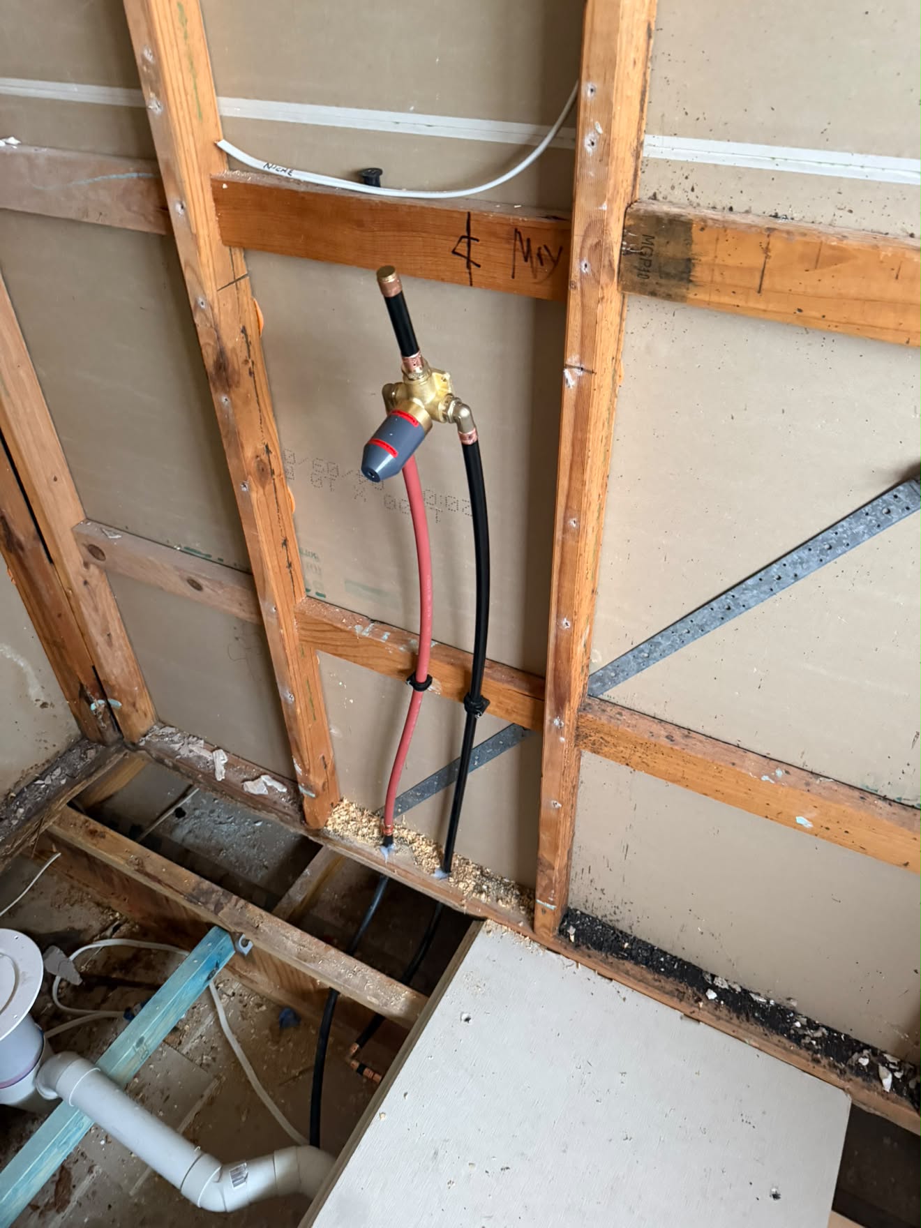 Shower mixer body on a noggin before sheeting, Wyee Point.