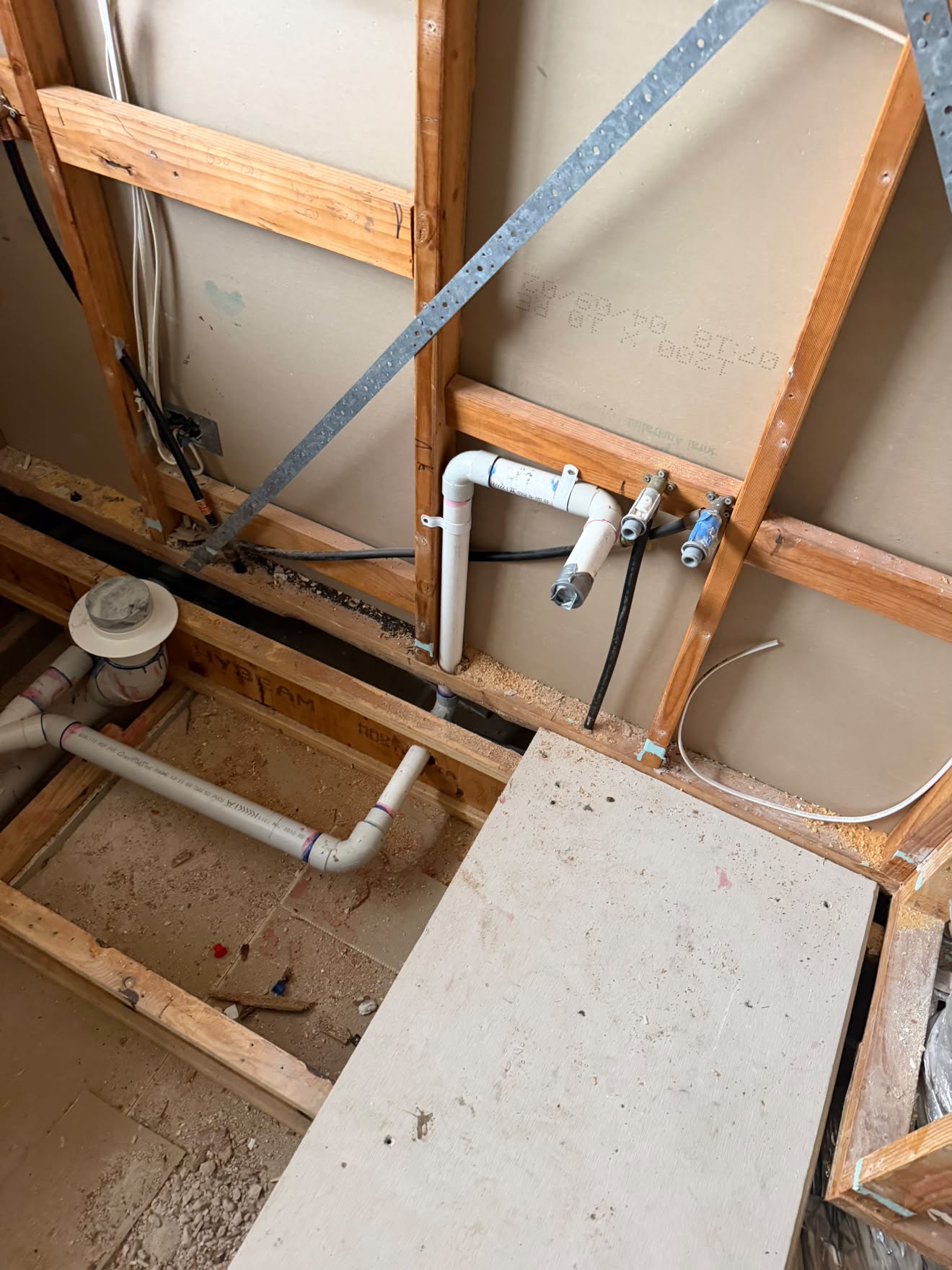 Pan connector, wastes and supply stubs before the floor goes back, Wyee Point.