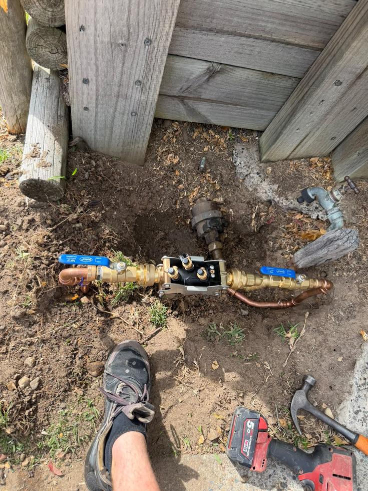 Backflow assembly going in, isolation valves and strainer either side of the device.