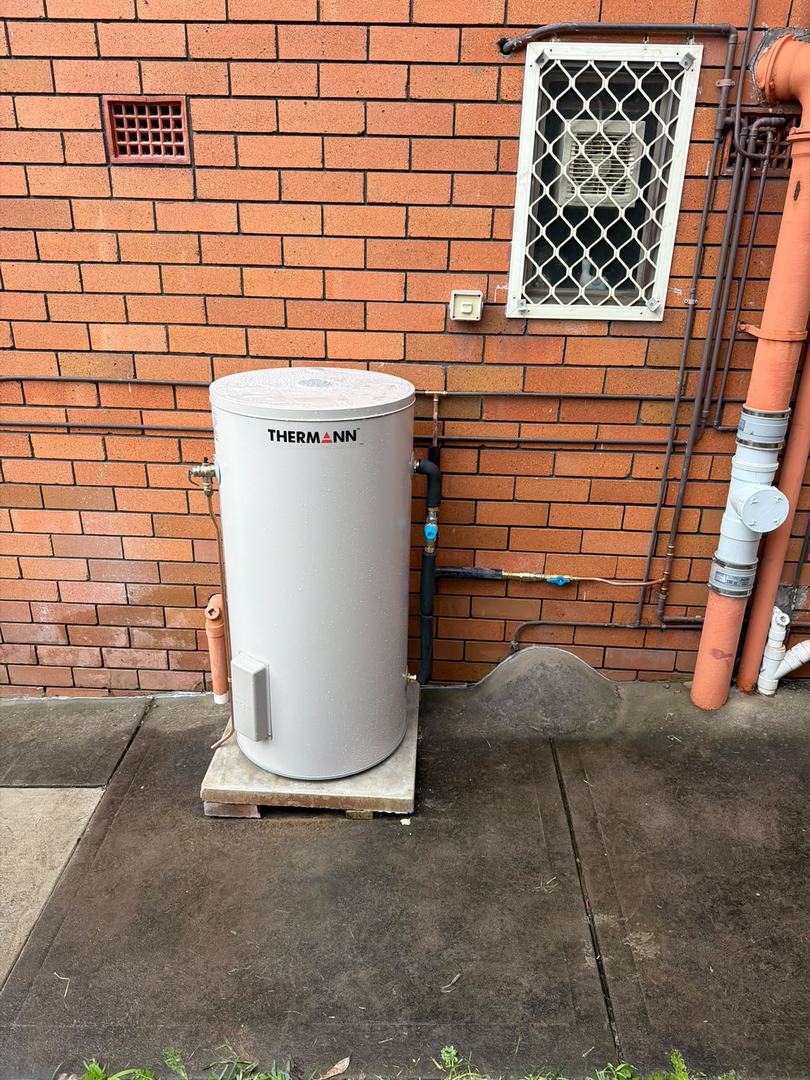 After: Thermann electric storage in on the same pad, valved and connected.