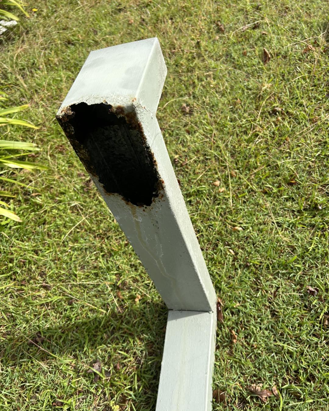 Failed metal downpipe, replaced with PVC
